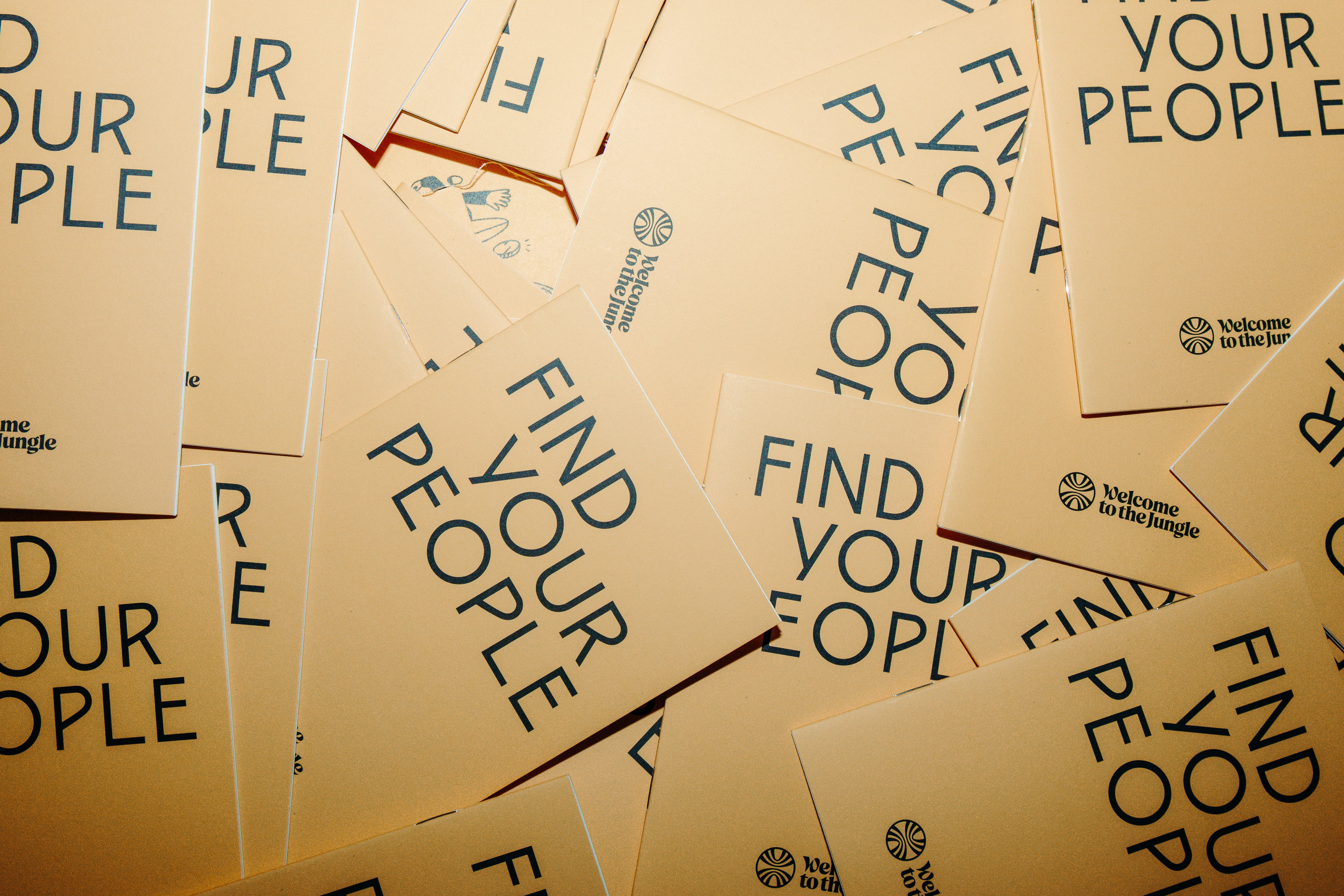 collection of yellow cards that say find your people